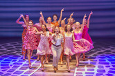 LtoR Tegan Banniester as Ali, Emma Mullen as Sophie, Sophie Matthew as Lisa with the cast of MAMMA MIA!