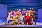 Front Row LtoR Michael Nelson as Eddie, Jack Danson as Sky, Alexandros Beshonges as Pepper with the cast of MAMMA MIA!
