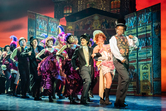 Stephen K Amos as Alfred P Doolittle with the company of My Fair Lady