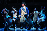 Trevor Dion Nicholas as George Washington and ensemble