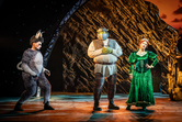 Brandon Lee Sears (Donkey), Antony Lawrence (Shrek) and Joanne Clifton (Fiona) in Shrek the Musical UK and Ireland Tour 2023-4  - Marc Brenner